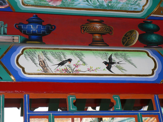swallowspainting Painting of swallows on building eave
